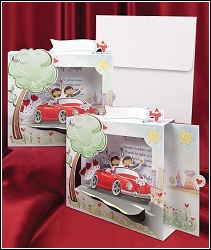 Trojrozměrné svatební oznámení 5429 s novomanželi v červeném autě